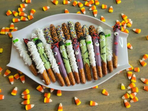 Halloween theme decorated Chocolate dipped pretzel rods
