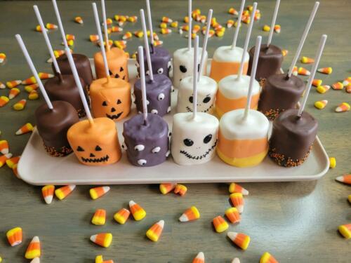Halloween theme decorated Chocolate dipped marshmallow pops.